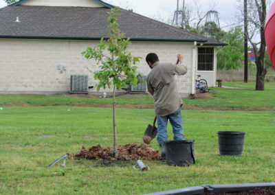 CenterPoint Energy Volunteers Plant Trees at Harbor Campus 14