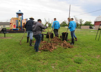 CenterPoint Energy Volunteers Plant Trees at Harbor Campus 16