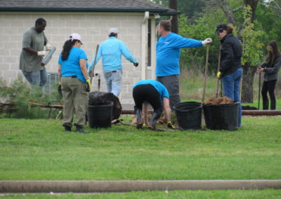 CenterPoint Energy Volunteers Plant Trees at Harbor Campus 31