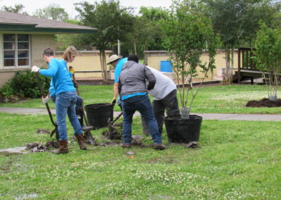 CenterPoint Energy Volunteers Plant Trees at Harbor Campus 36